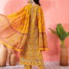 woman in yellow printed anarkali kurta set with dupatta
