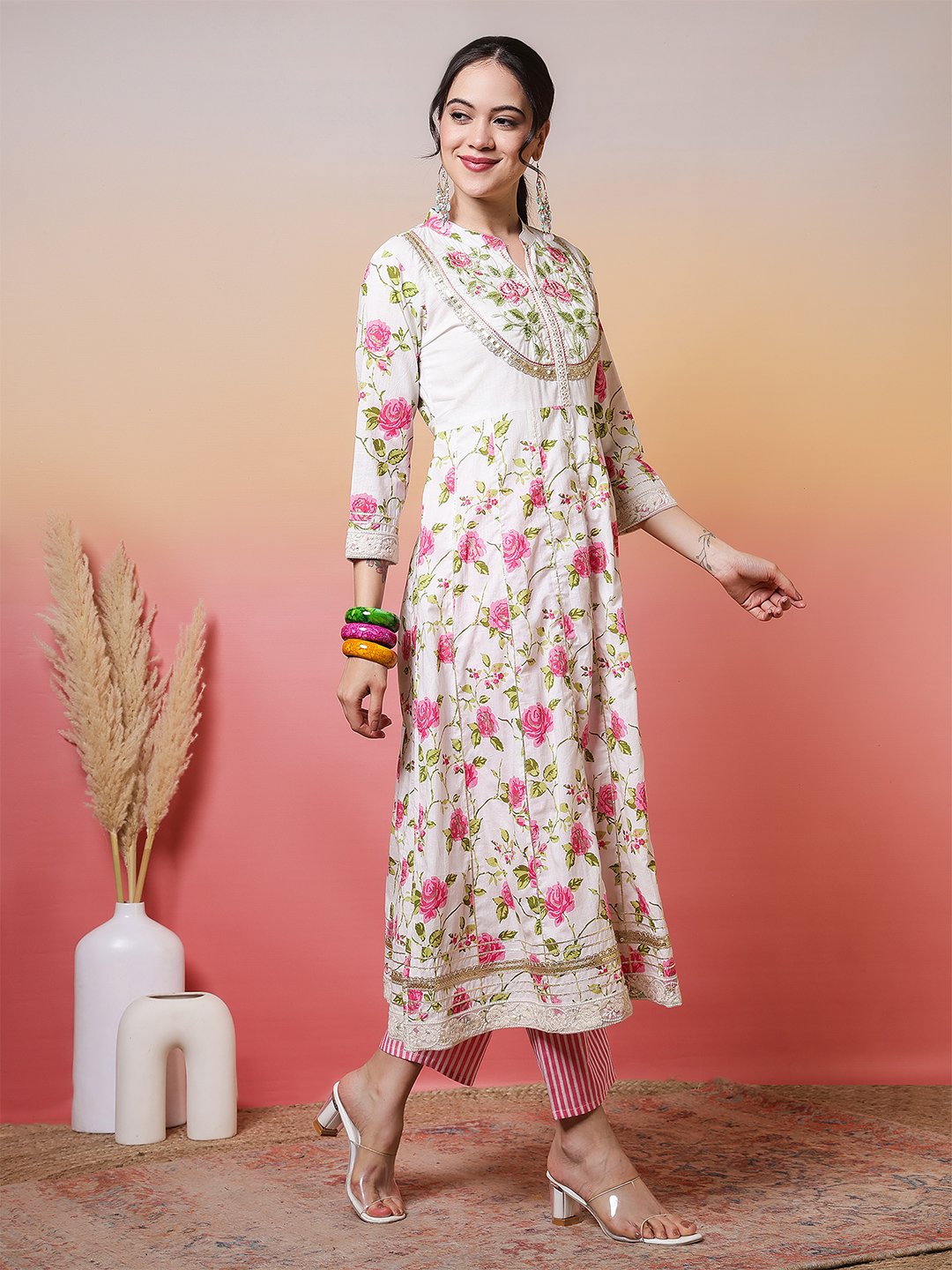 elegant white anarkali suit set with pink rose print and embroidered yoke