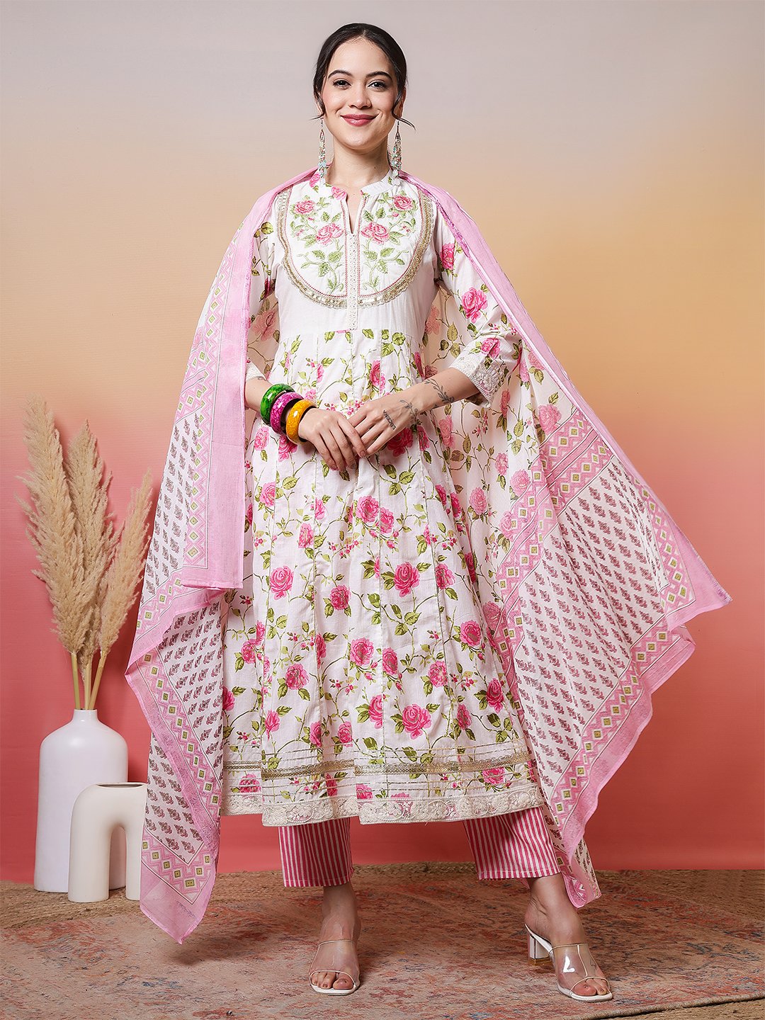 elegant white anarkali suit set with pink rose print and embroidered yoke