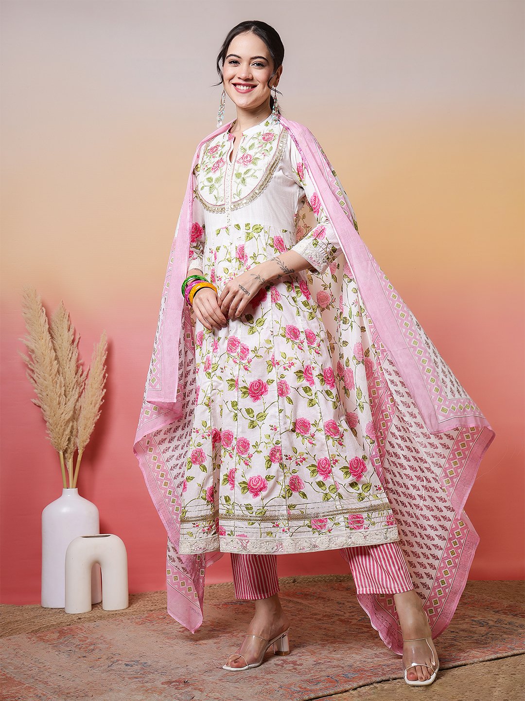 elegant white anarkali suit set with pink rose print and embroidered yoke