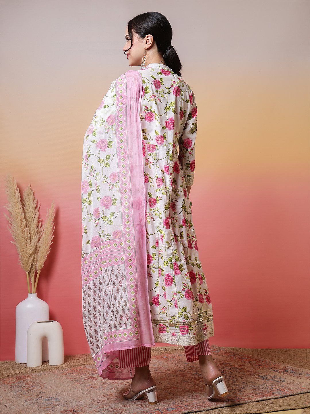 elegant white anarkali suit set with pink rose print and embroidered yoke