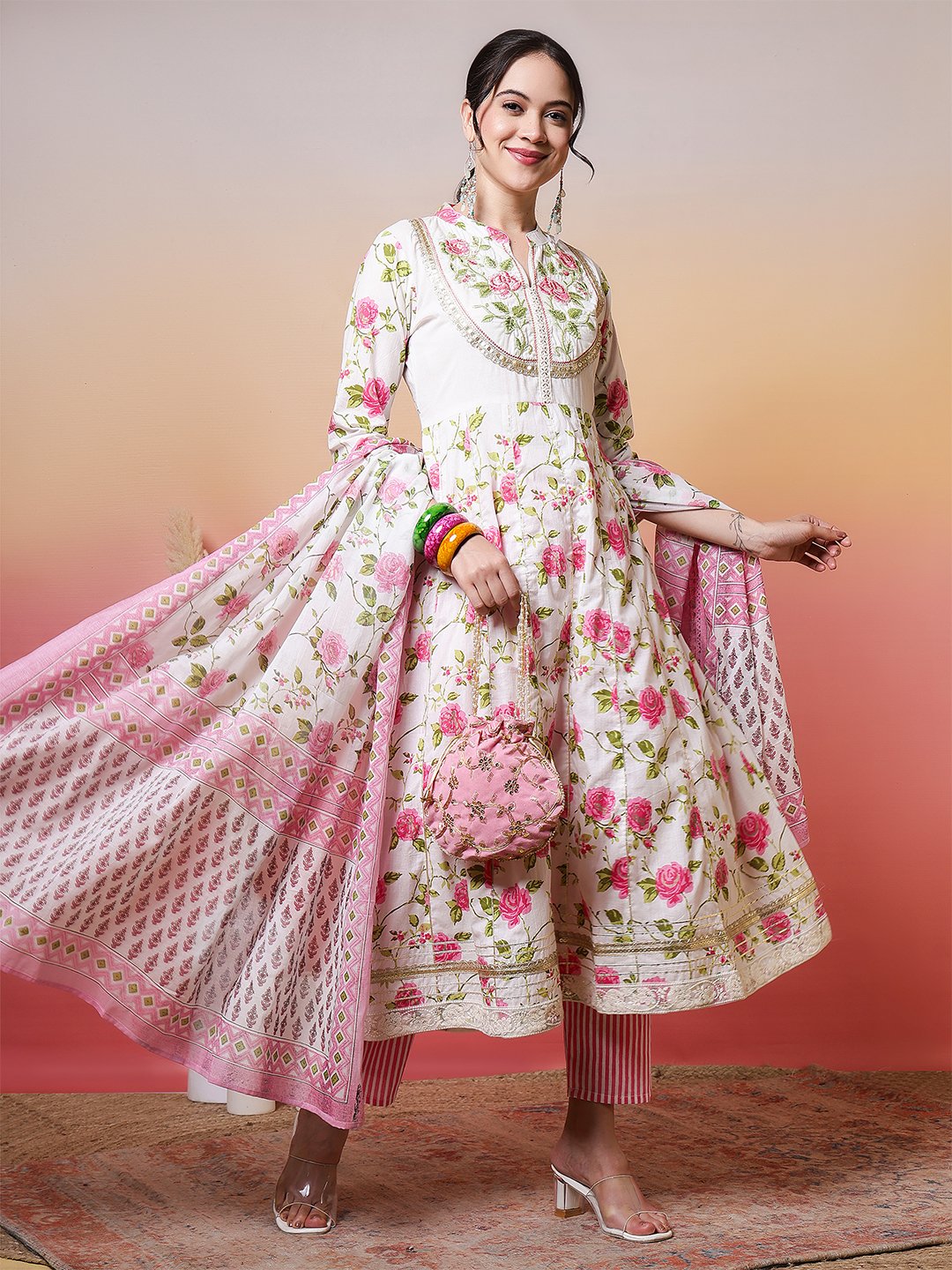 elegant white anarkali suit set with pink rose print and embroidered yoke
