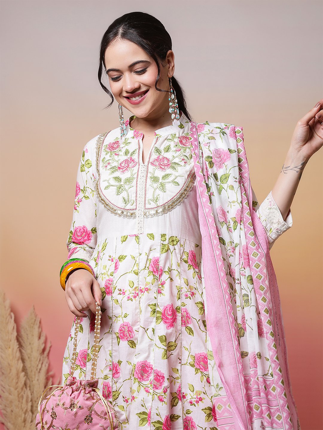 elegant white anarkali suit set with pink rose print and embroidered yoke