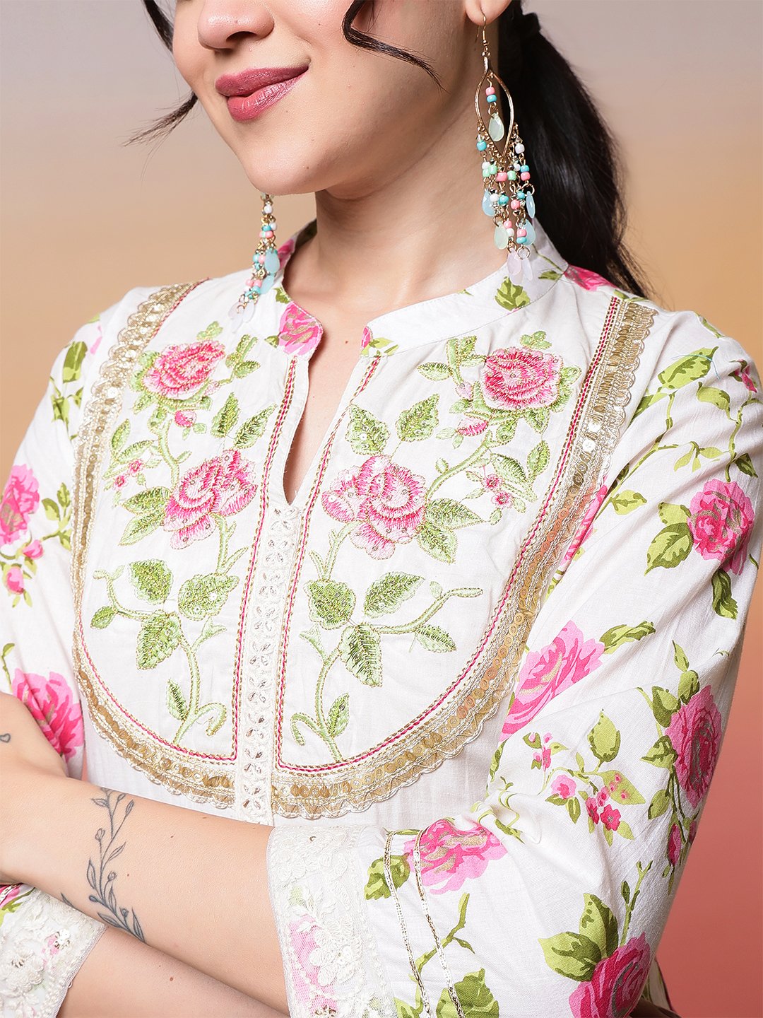 elegant white anarkali suit set with pink rose print and embroidered yoke