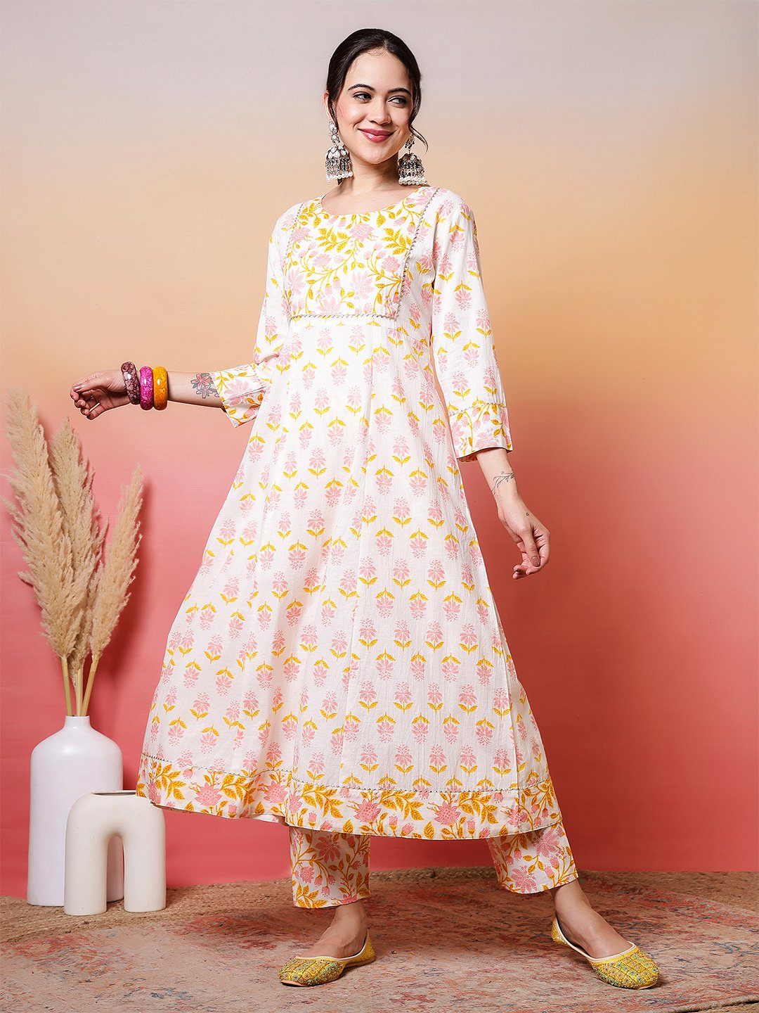 soft white and pastel pink yellow floral block print anarkali suit set