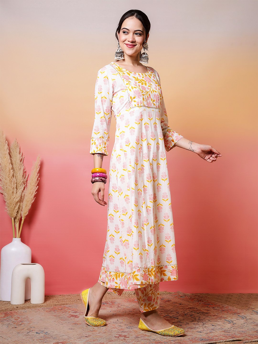 soft white and pastel pink yellow floral block print anarkali suit set