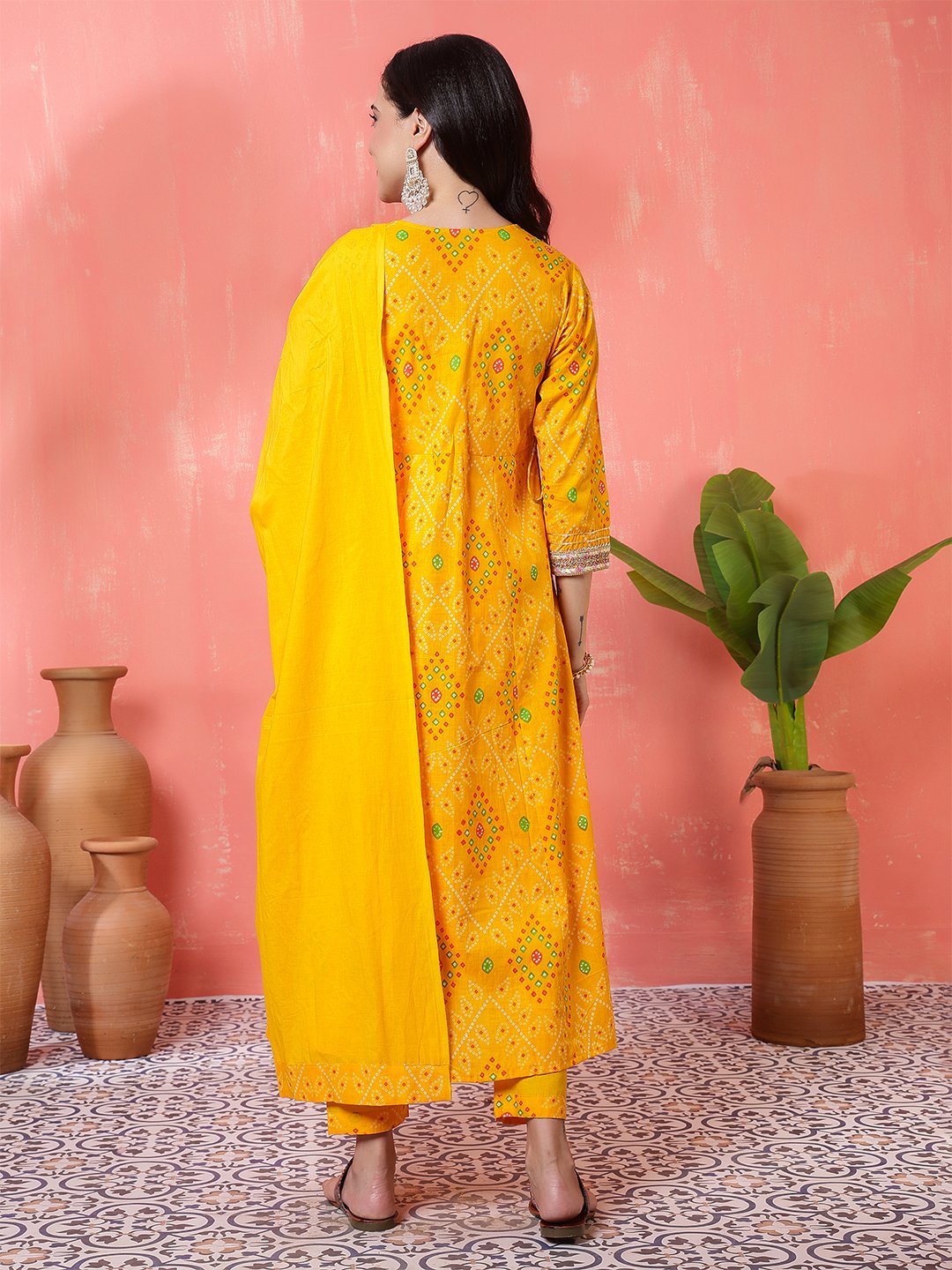 bright yellow angrakha style printed cotton suit set