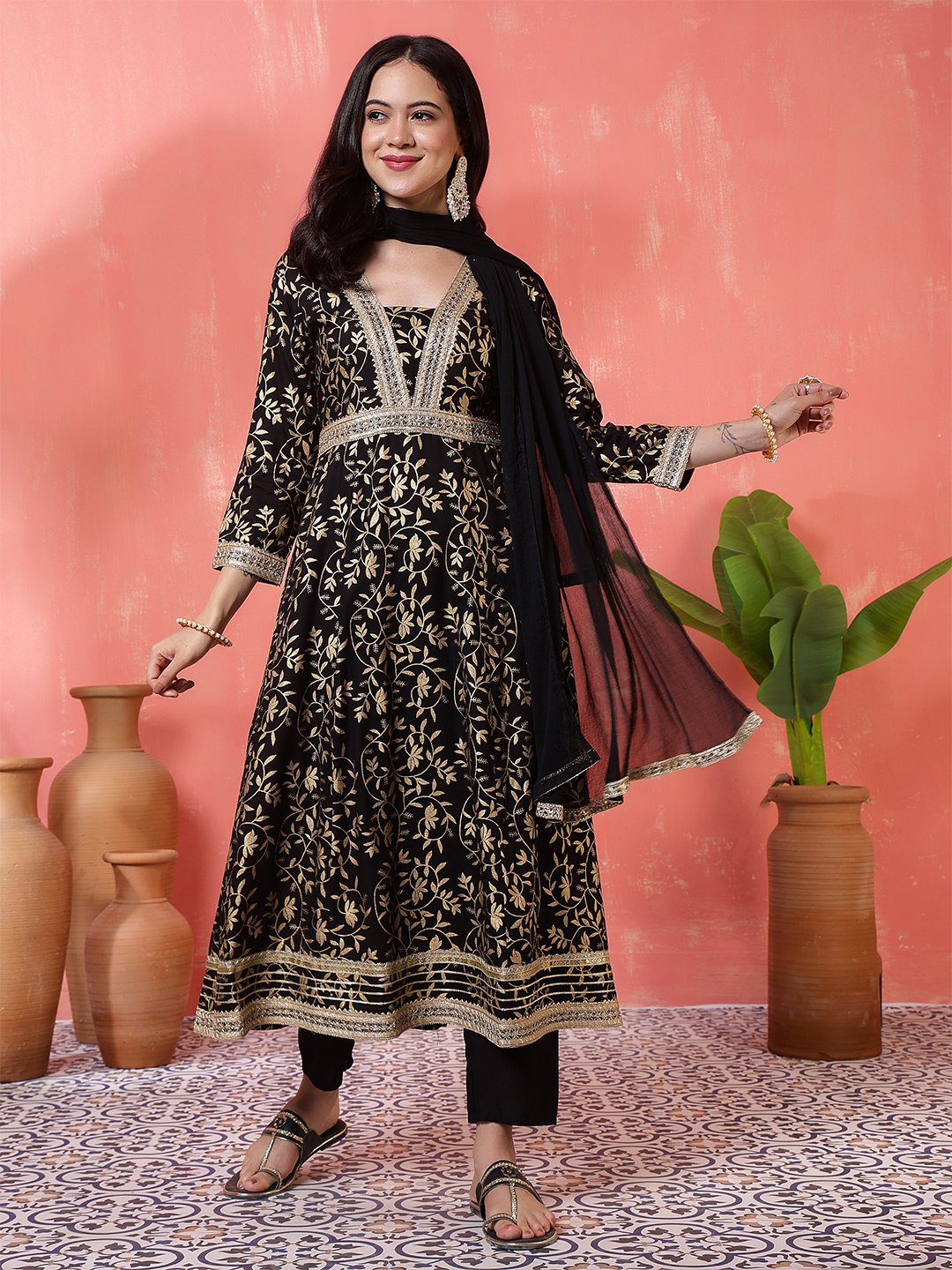 regal black anarkali suit set with gold foliage print and metallic trim