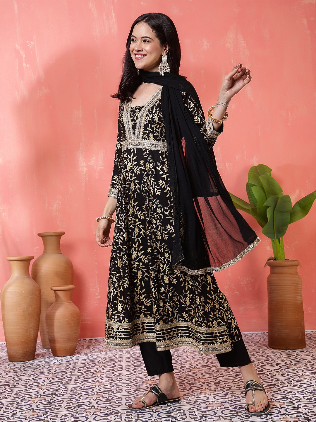 regal black anarkali suit set with gold foliage print and metallic trim